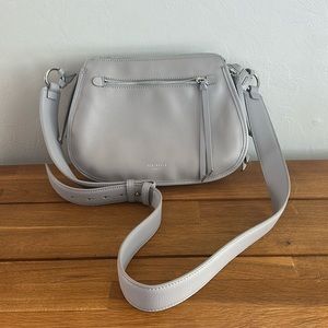 Ted Baker HEATHERR CURVED LEATHER CROSSBODY BAG IN LIGHT GREY
